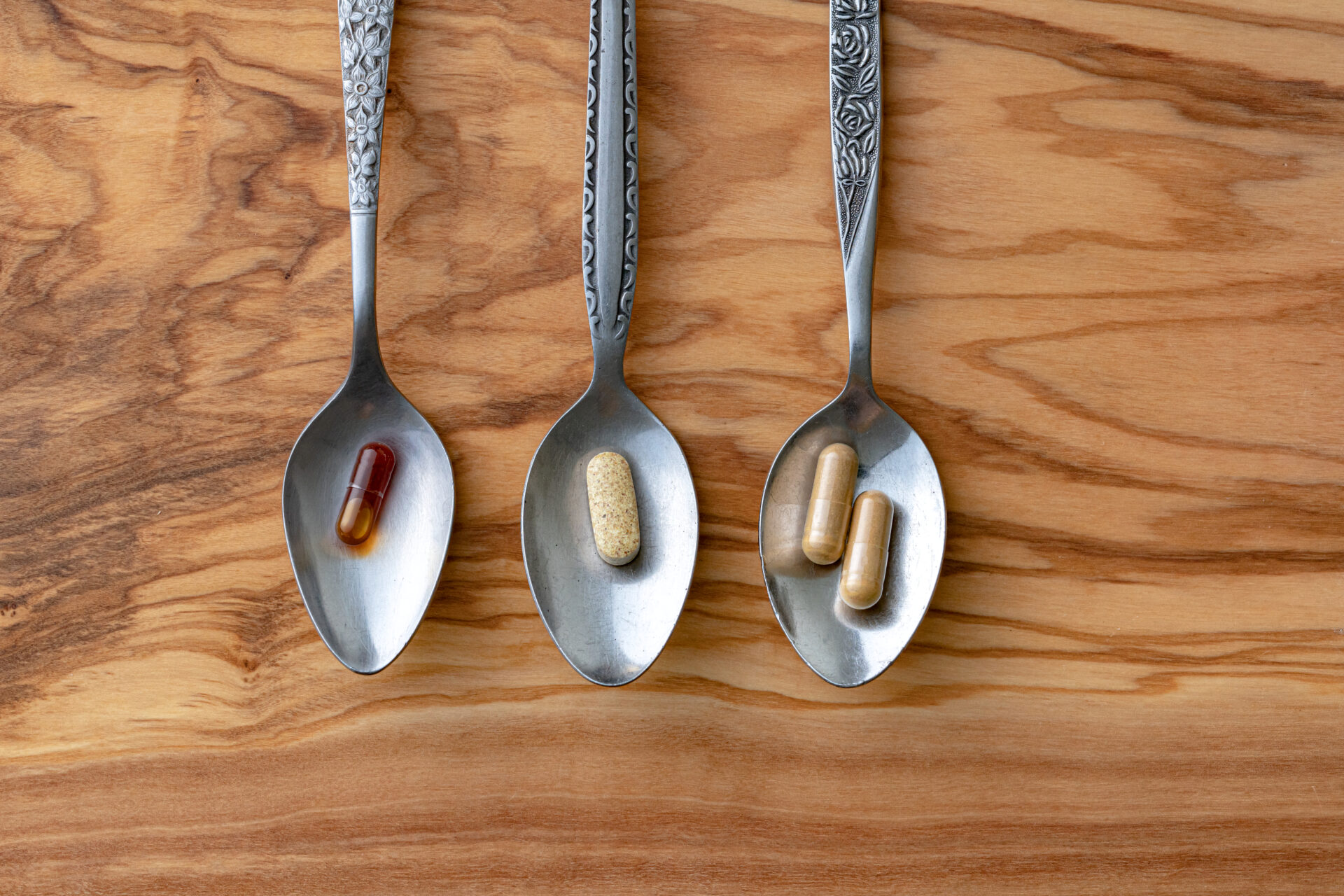 Master Formula lined up on spoons over a wooden surface - Young Living Lavender Life Blog 