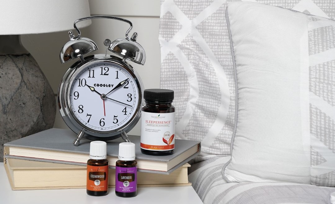 Young Living essential oil products and an alarm clock
